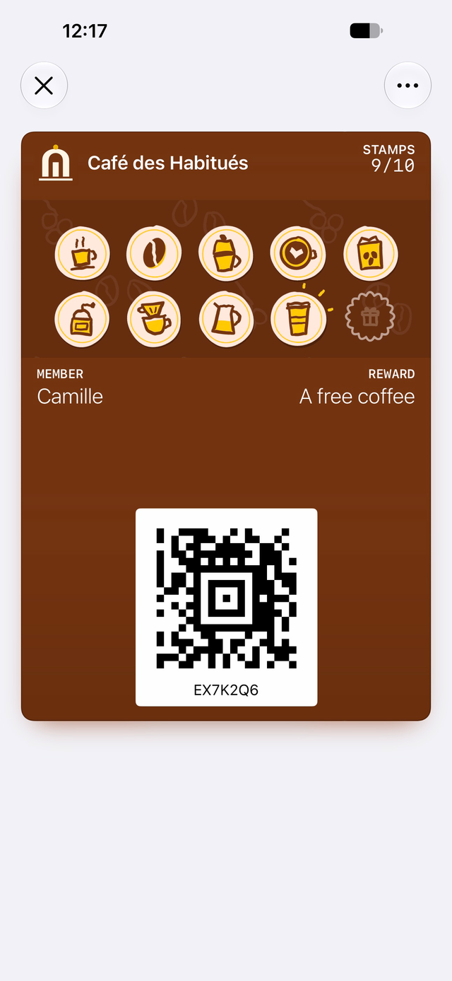 Sample loyalty card from Café des Habitués in Apple Wallet: 9 of 10 stamps, reward: A free coffee.